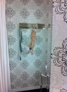 Here's a photo of my new bra hanging up beside the measuring tape in the dressing room. 