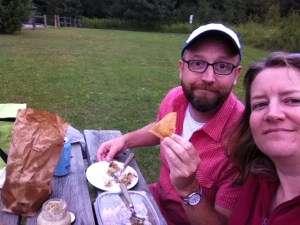 Picnic with cheap samosas, side salads and dips.